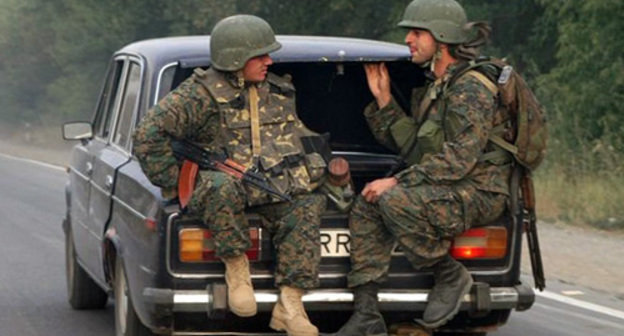 Солдаты грузинской армии покидают территорию Южной Осетии, август 2008 года. Фото: http://commons.wikimedia.org