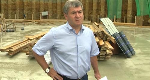 Мугдин Чермит. Скриншот видео "Вести Сочи" https://www.youtube.com/watch?v=l3sjNadZsXk Мугдин Чермит. Скриншот видео "Вести Сочи" https://www.youtube.com/watch?v=l3sjNadZsXk