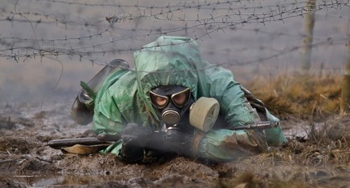 Военнослужащий в костюме радиохимической и биологической защиты. Фото: пресс-служба Минобороны РФ,https://www.mil.ru Военнослужащий в костюме радиохимической и биологической защиты. Фото: пресс-служба Минобороны РФ,https://www.mil.ru