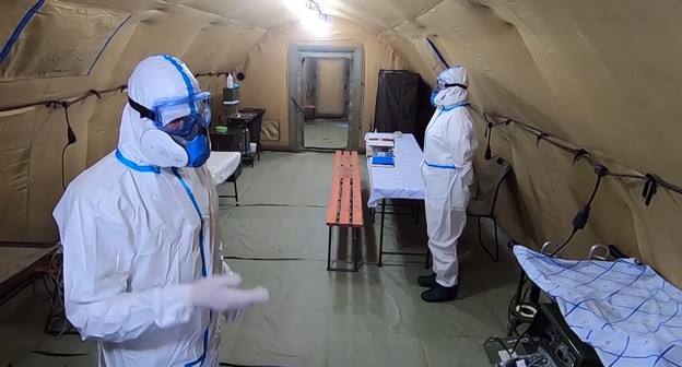 Врач госпиталя Минобороны. Кадр видео пресс-службы МО России https://function.mil.ru/news_page/country/more.htm?id=12321951@egNews Врач госпиталя Минобороны. Кадр видео пресс-службы МО России https://function.mil.ru/news_page/country/more.htm?id=12321951@egNews