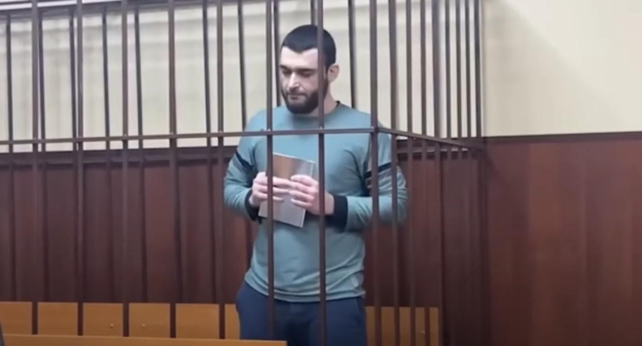 Абдулмумин Гаджиев. Кадр видео канала ROMB https://www.youtube.com/watch?v=0jex6a8-VIg Абдулмумин Гаджиев. Кадр видео канала ROMB https://www.youtube.com/watch?v=0jex6a8-VIg