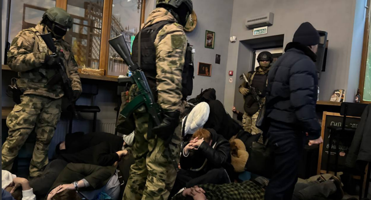 Силовики на "Лимоновских чтениях" в краснодаре. Скриншот фото "Национальная правозащита" от 18.01.26, https://t.me/rightsofnation/2453