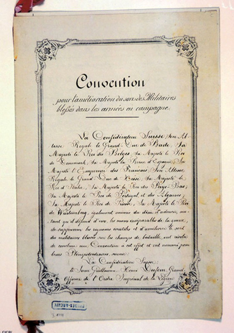 Первая страница Женевской Конвенции от 22 августа 1864 года. Оригинал хранится в федеральном архиве г.Берна. Первая страница Женевской Конвенции от 22 августа 1864 года. Оригинал хранится в федеральном архиве г.Берна.